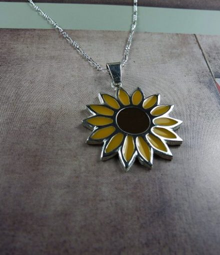 Dije Girasol con Resina