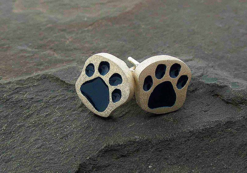 Aretes Huellas