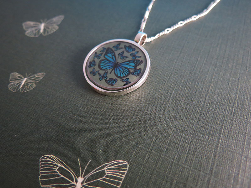 Dije Mariposas Encapsulado - Imagen 2