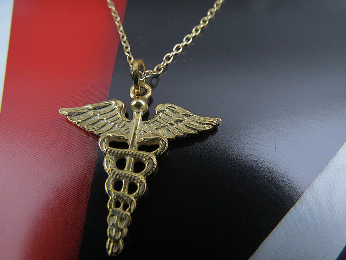 Dije Caduceo